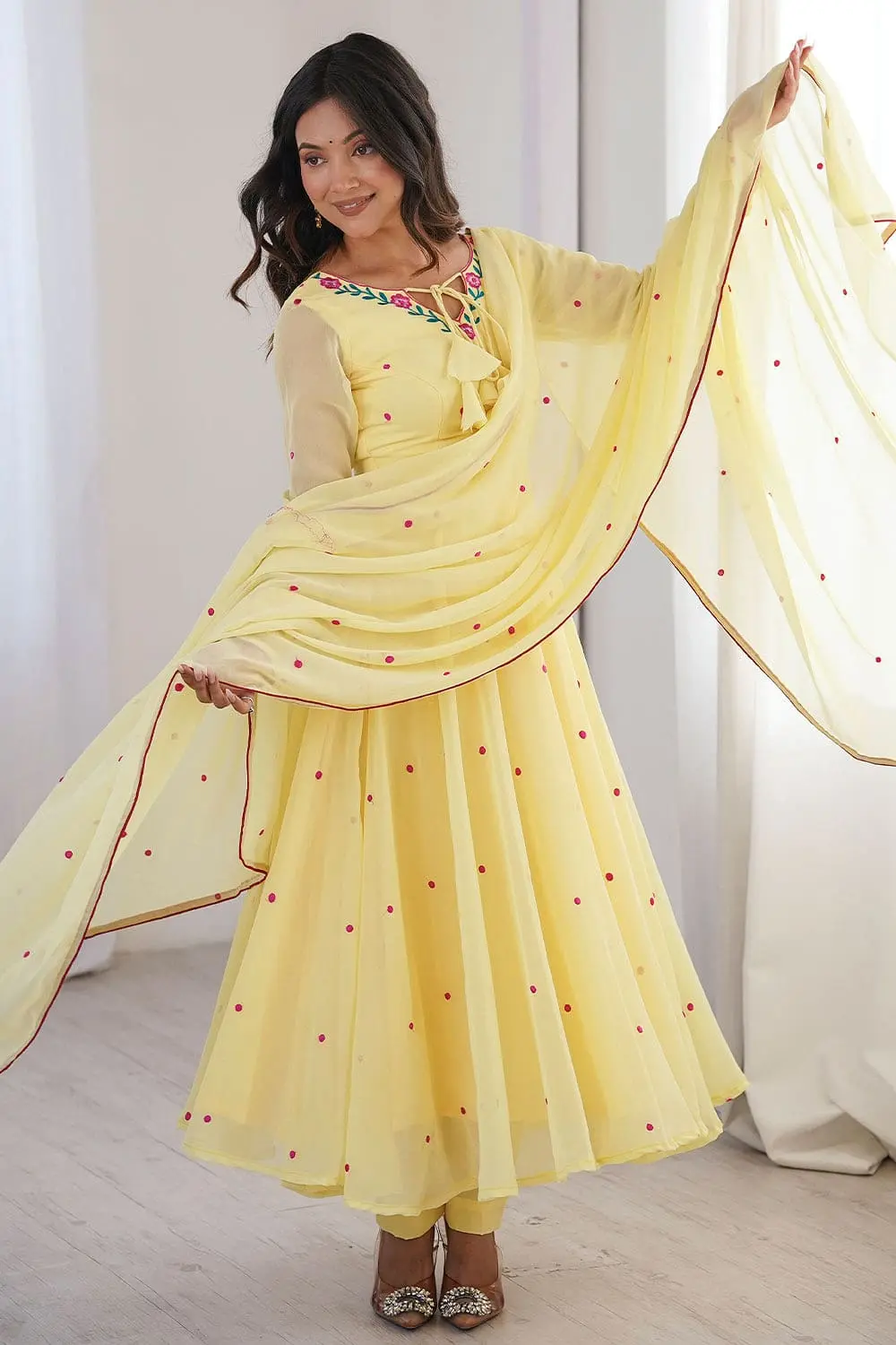 Yellow anarkali set with micro cotton pant and piped dupatta full length view