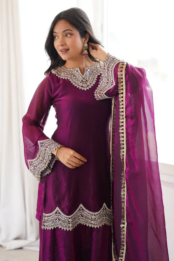 Close up fancy lace on purple party wear salwar kameez